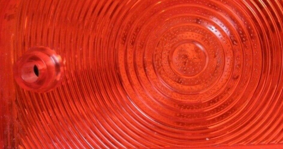 One New Old Stock Red Bedford TK Rear Light Lens Lucas Butlers With Fitting Kit.
