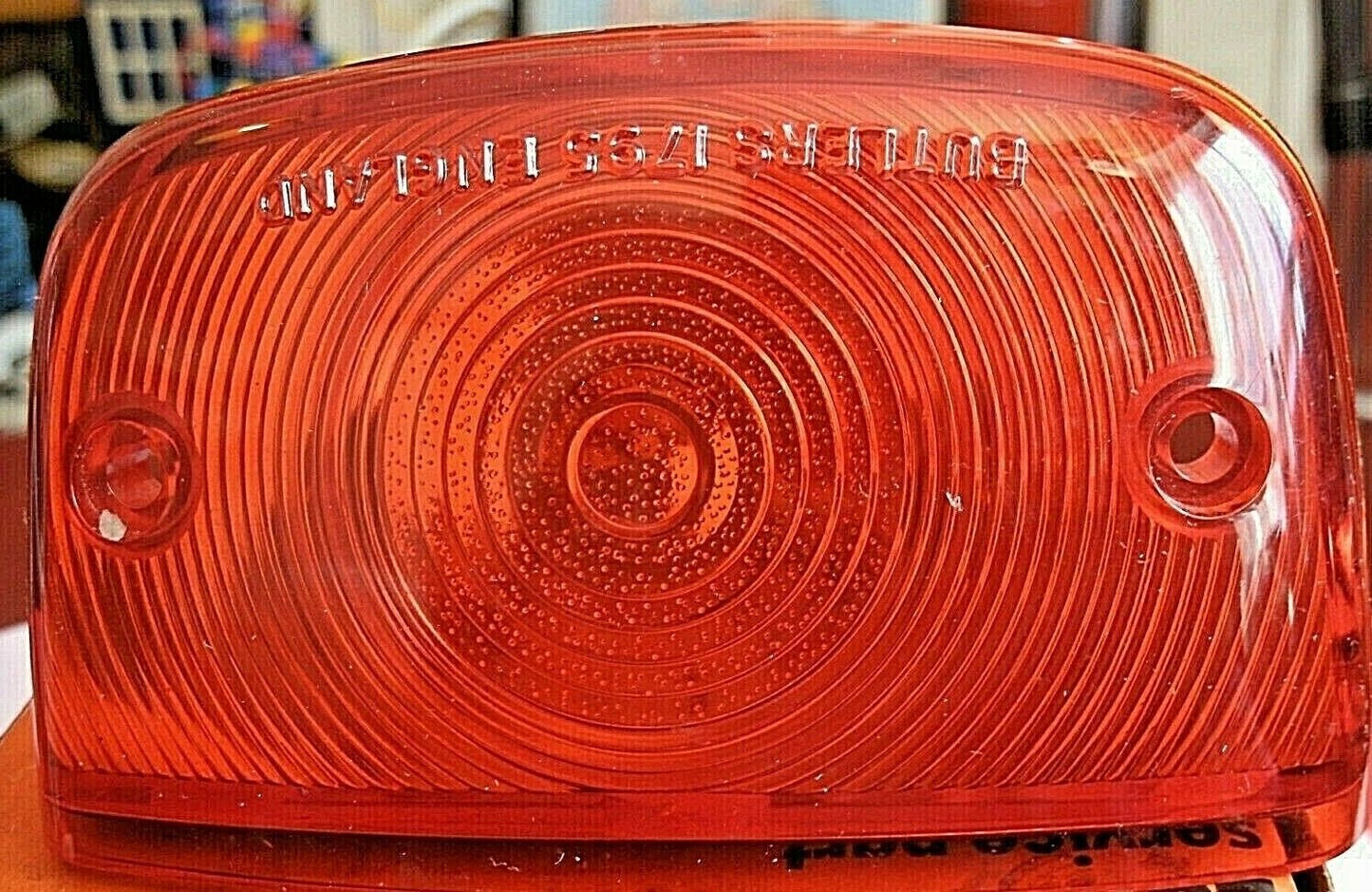 One New Old Stock Red Bedford TK Rear Light Lens Lucas Butlers With Fitting Kit.