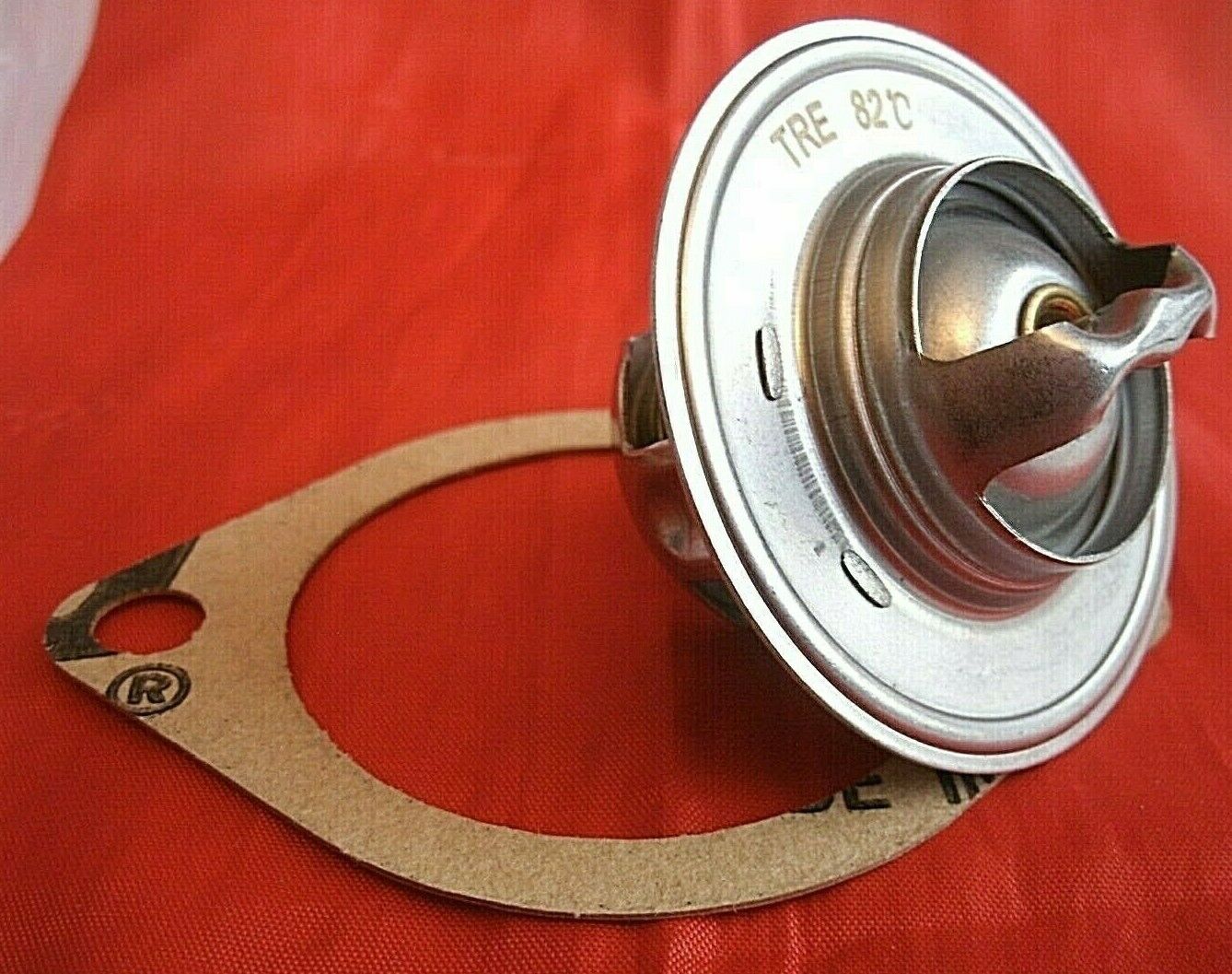 One New Triumph 3 Litre V8 Stag 82% Thermostat & Improved Quilty 1/16" Gasket.