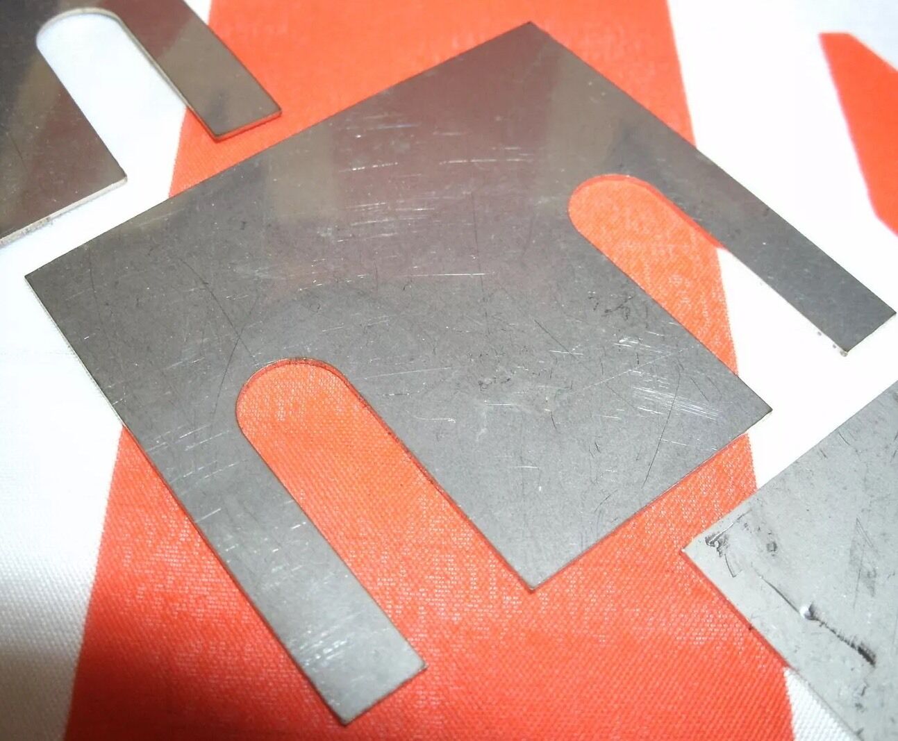 Triumph TR5 TR6 ONE NEW 0.275" REAR TRAILING ARM SHIM IN STAINLESS STEEL.