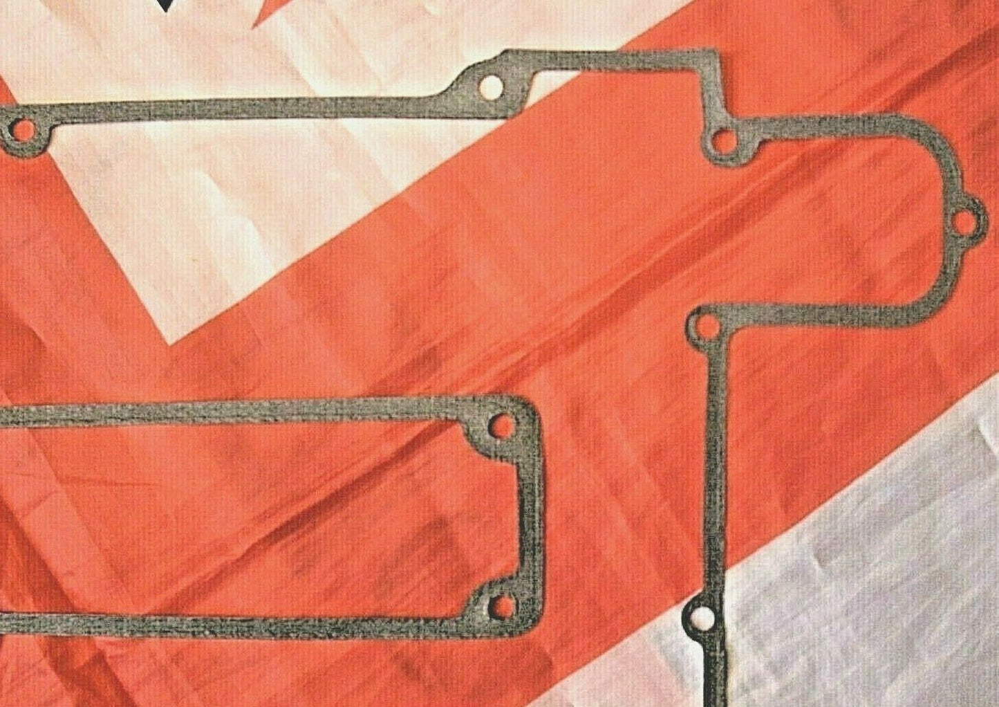 Aston Martin V8 1968 on One New Cam cover Gasket Made in Beta gasket material.