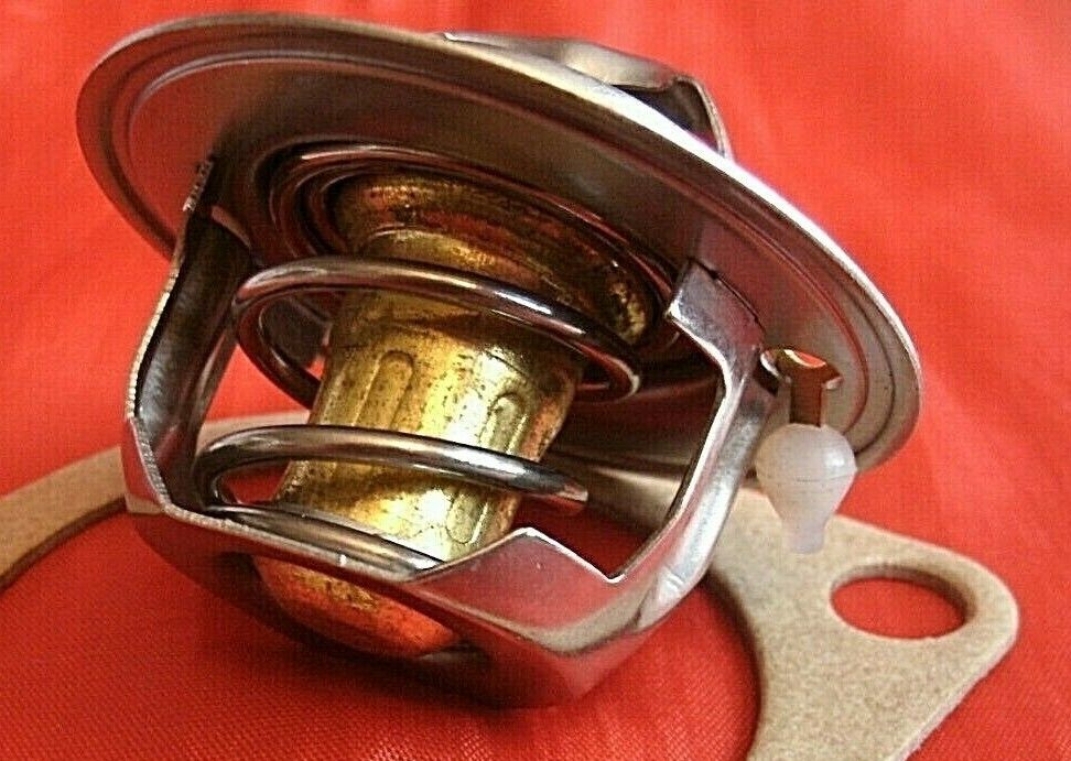 One New Triumph 3 Litre V8 Stag 82% Thermostat & Improved Quilty 1/16" Gasket.